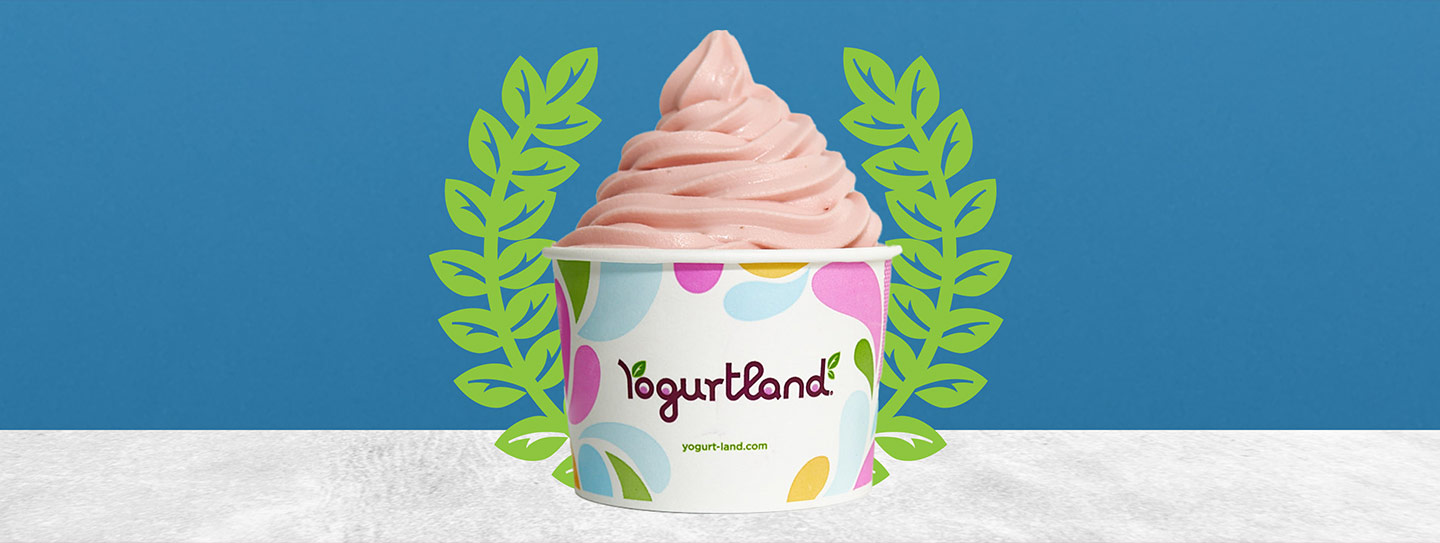 A cup of frozen yogurt alongside a winners wreath.